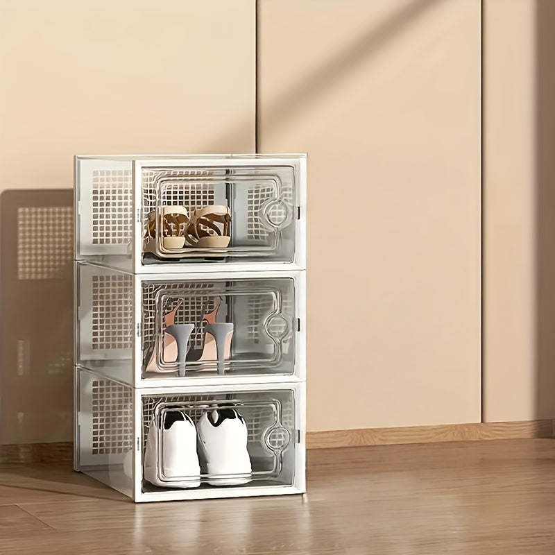 Clear shoe storage boxes stacked in closet space