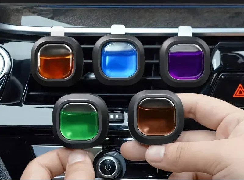 Vent clip air freshener attached to car air vent