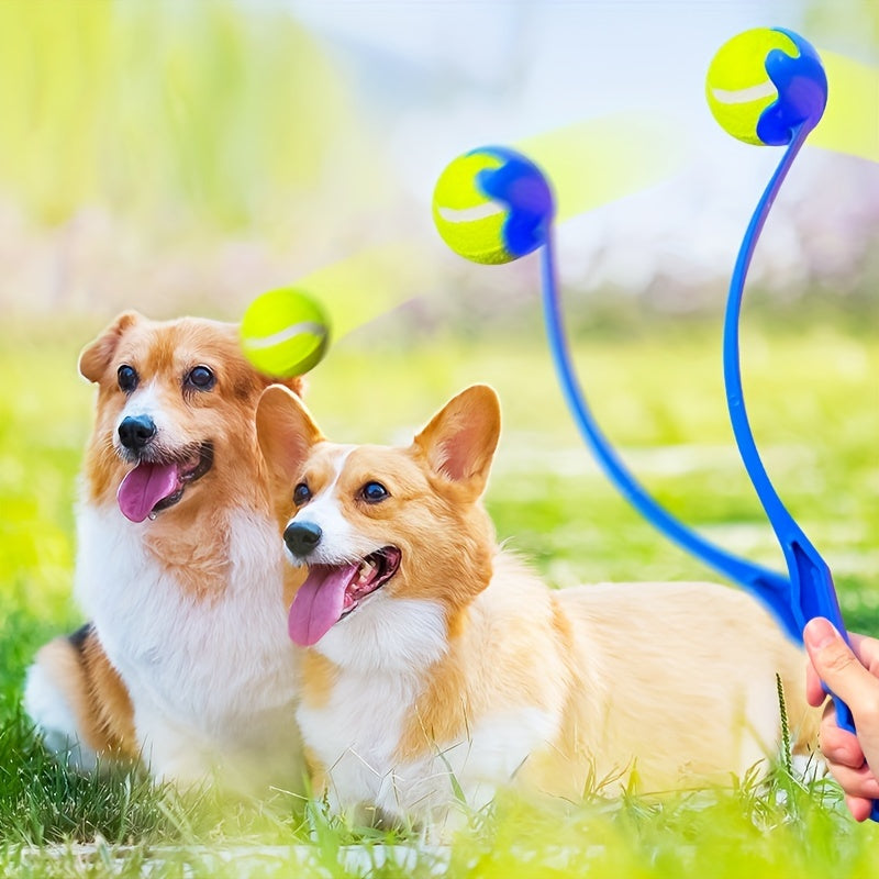 Dog ball launcher stick throwing tennis ball in park
